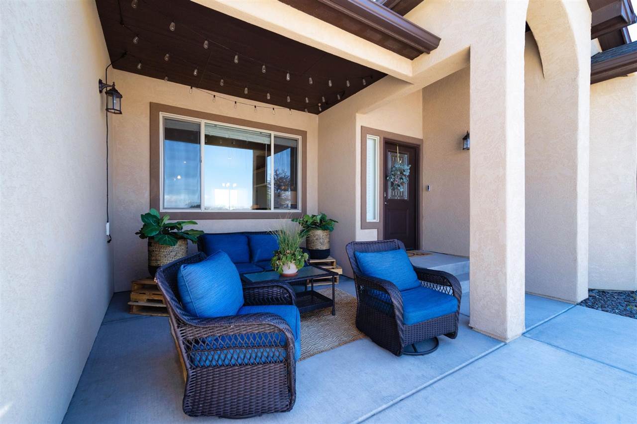 1554 17 Road Loma, CO 81524 - Photo 2 of 16 a living room with furniture and a potted plant