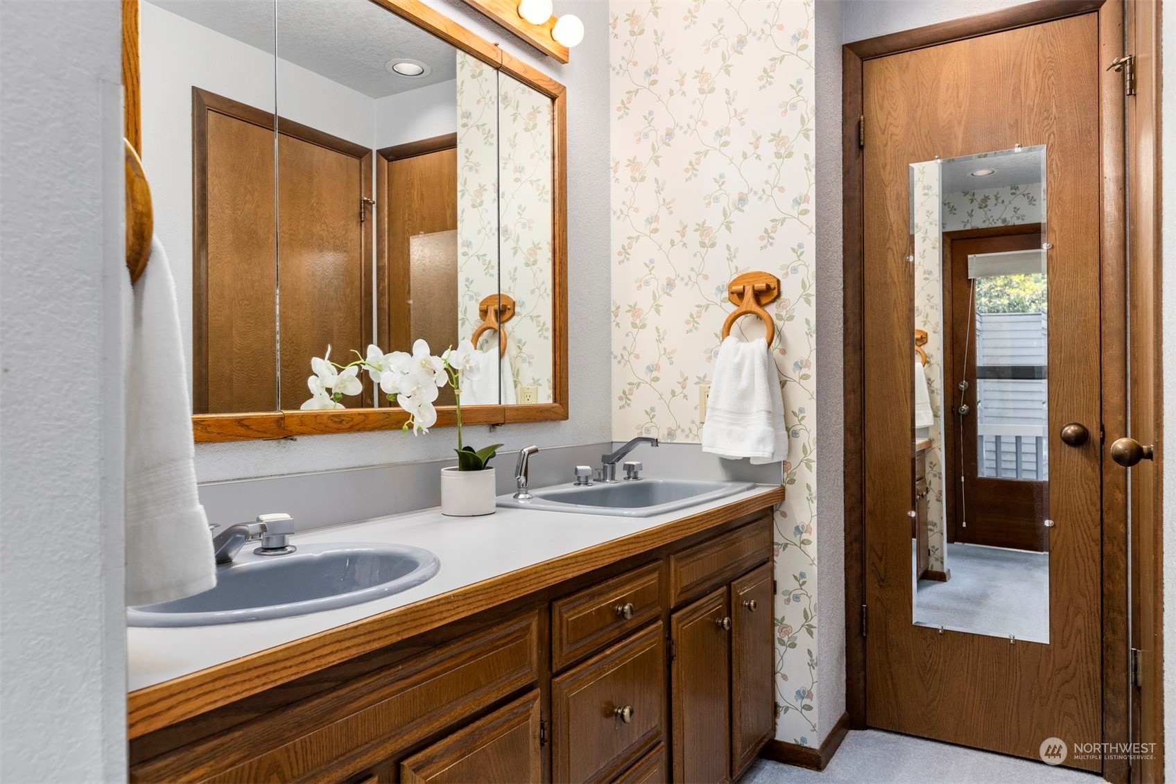 623 Briar Road Bellingham, WA 98225 - Photo 24 of 40 a bathroom with a double vanity sink and a mirror