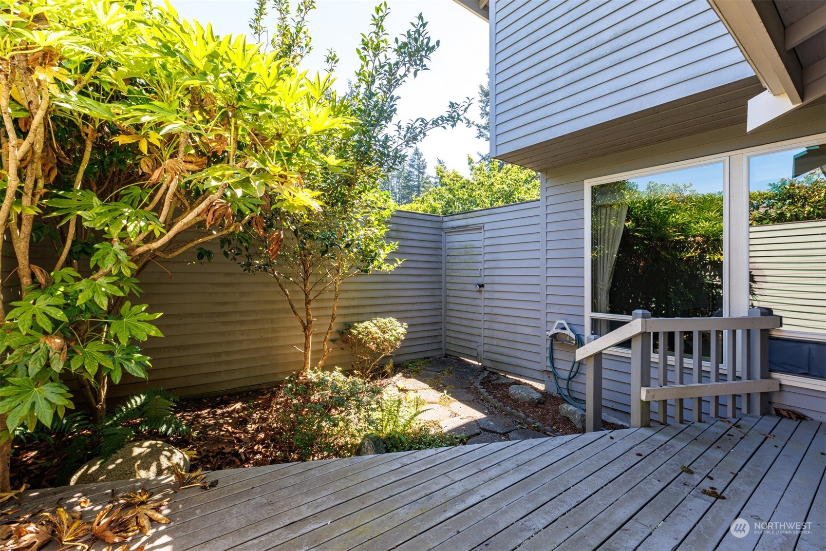 623 Briar Road Bellingham, WA 98225 - Photo 25 of 40 a view of a wooden deck and a patio