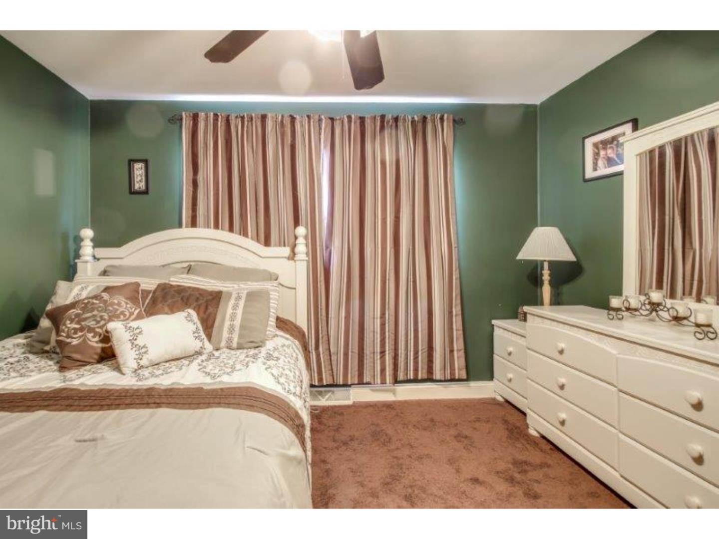 206 Swarthmore Road Glassboro, NJ 08028 - Photo 13 of 24 a bedroom with a bed and a closet