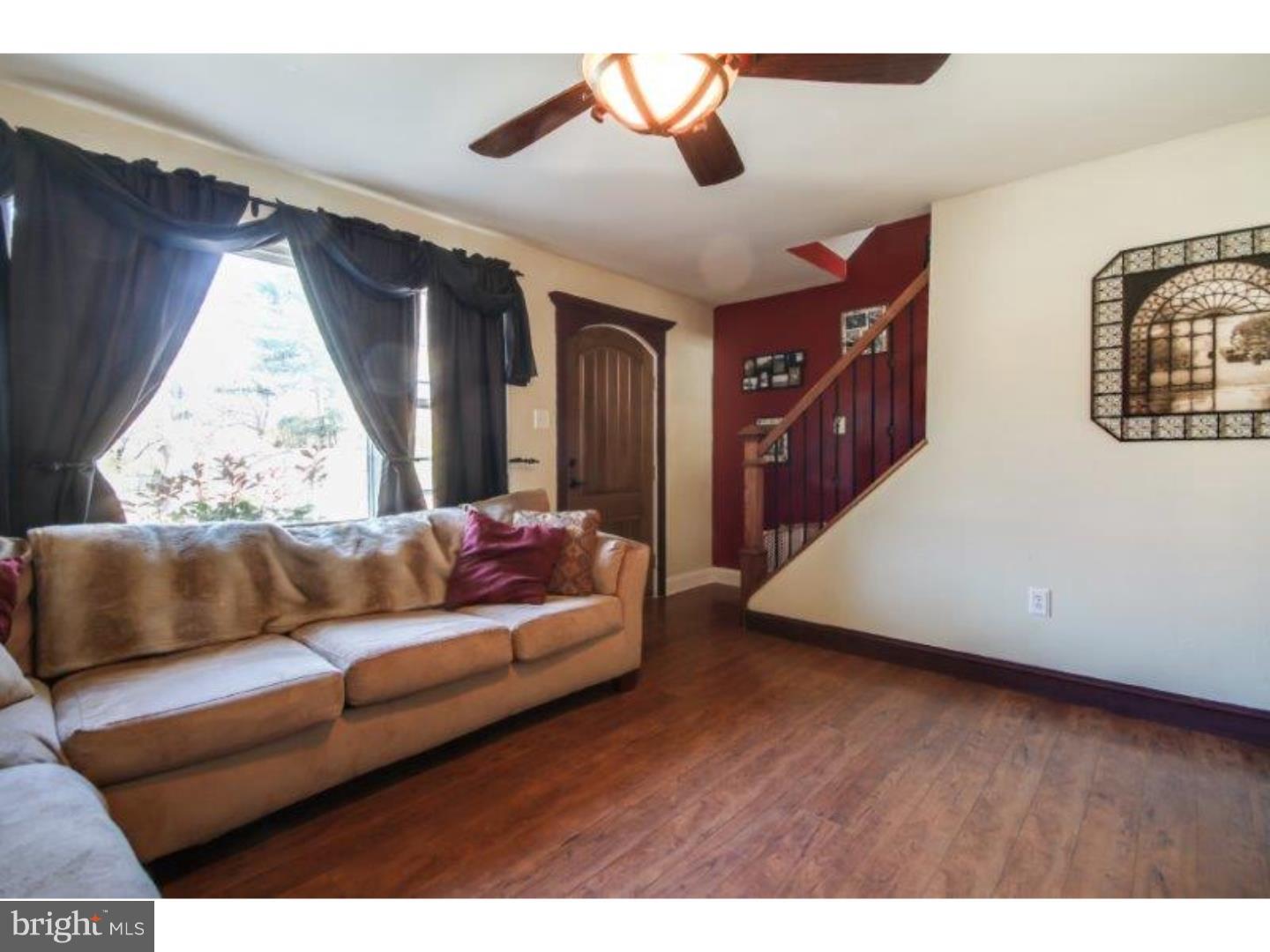 206 Swarthmore Road Glassboro, NJ 08028 - Photo 10 of 24 a living room with furniture and wooden floor