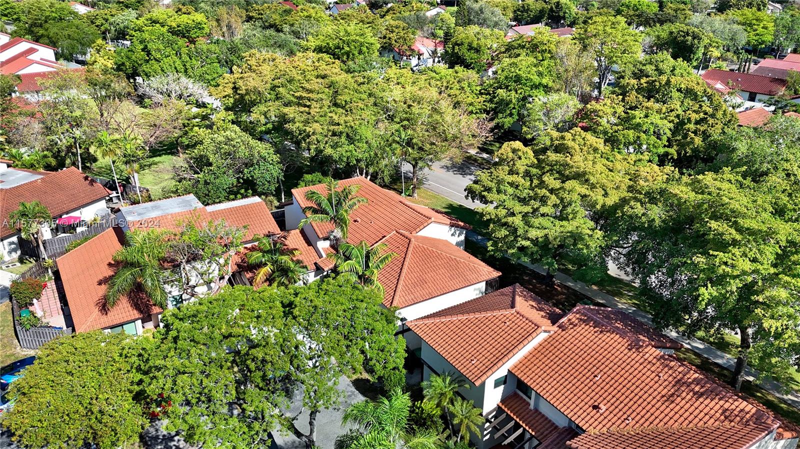 13339 Southwest 112th Terrace, Unit 504 Miami, FL 33186 - Photo 26 of 26 an aerial view of a house with a yard