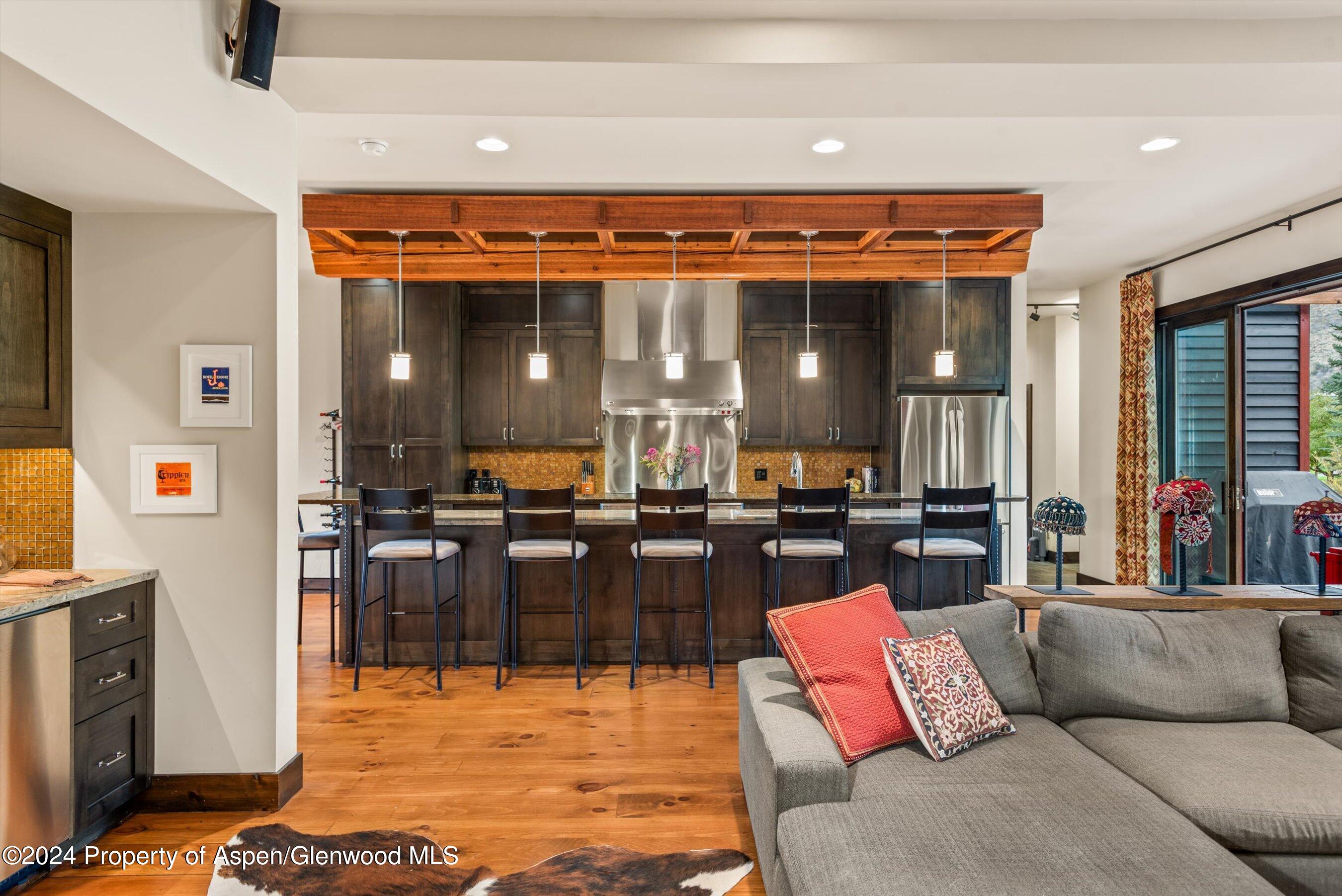 342 Sopris Circle Basalt, CO 81621 - Photo 15 of 34 a living room with furniture and kitchen view