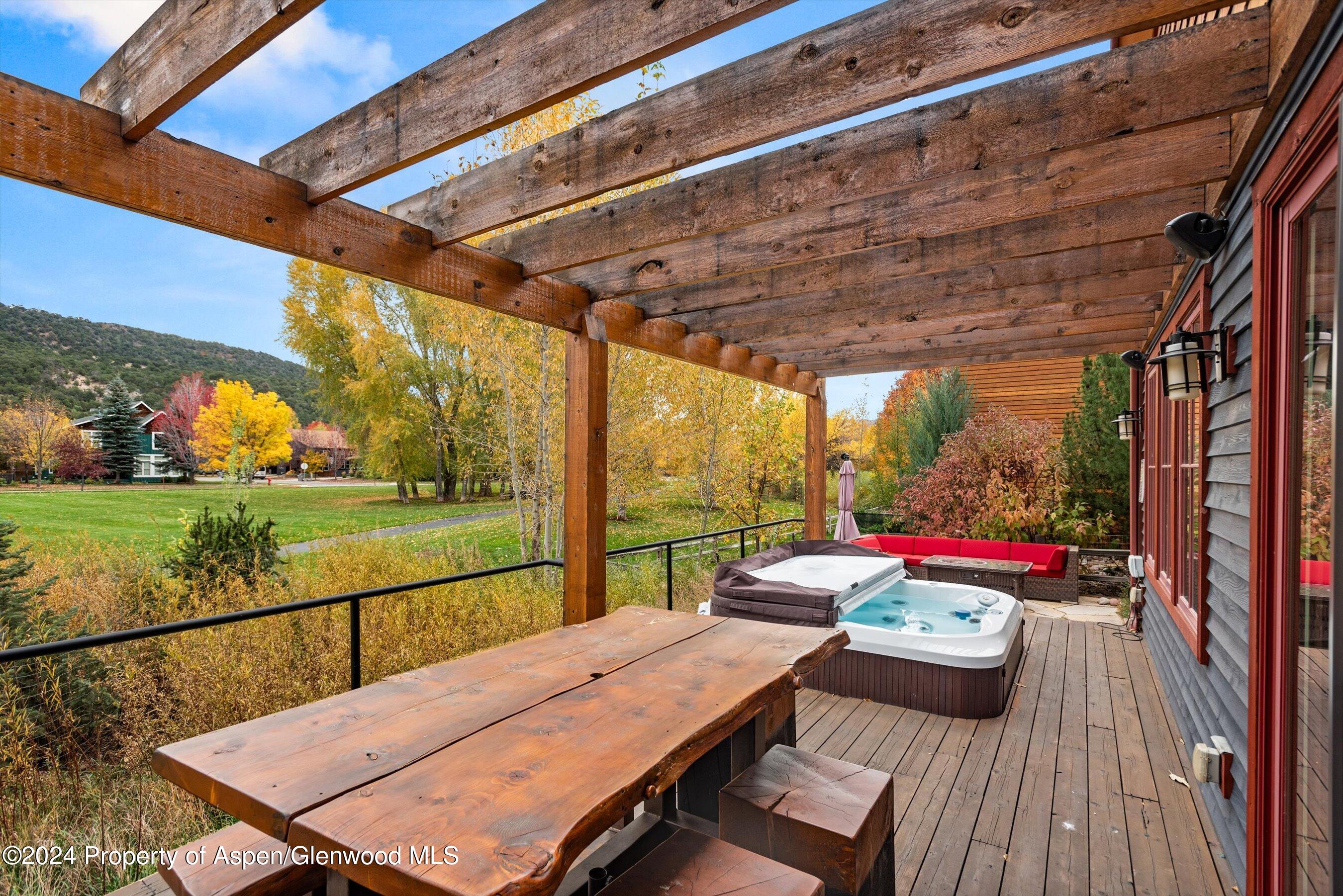 342 Sopris Circle Basalt, CO 81621 - Photo 2 of 34 a view of deck with furniture and garden
