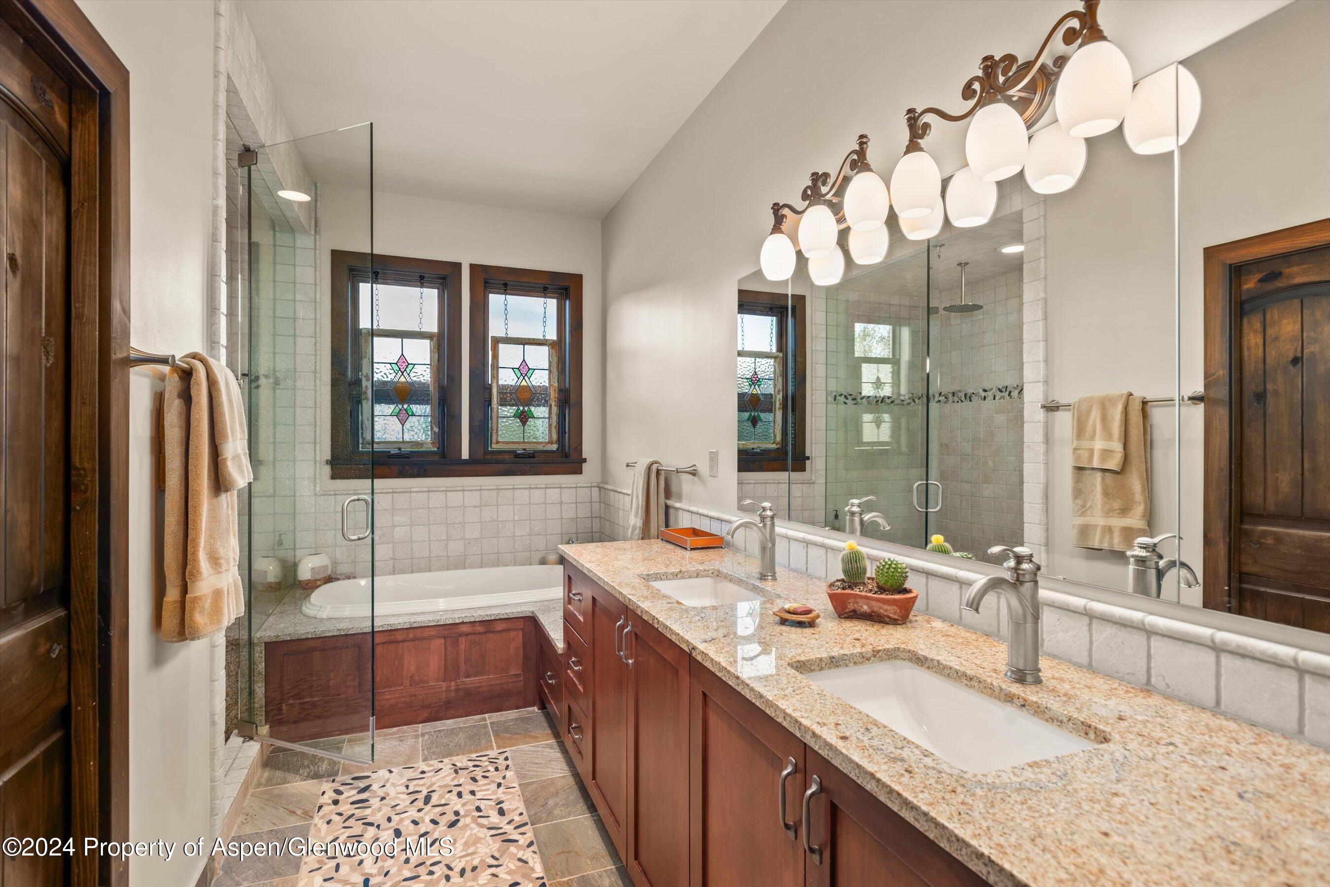 342 Sopris Circle Basalt, CO 81621 - Photo 10 of 34 a bathroom with double vanity sink and a mirror