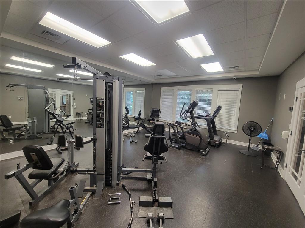 321 Lookover Drive Anderson, SC 29621 - Photo 18 of 20 Fitness enthusiasts will appreciate this well-equipped gym with ample exercise equipment and large reflective wall panels.