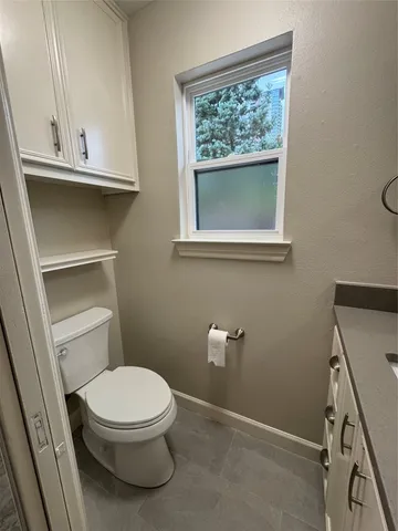 a bathroom with a toilet