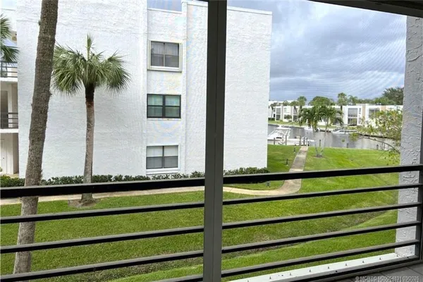 a view of swimming pool from a window