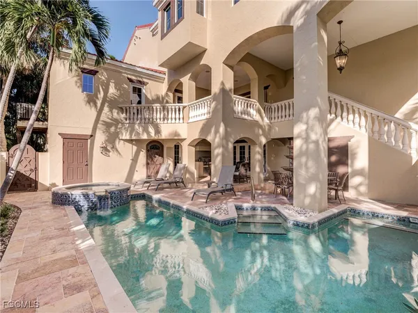 a view of pool with patio