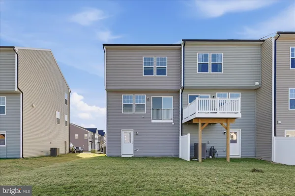 a front view of house with yard
