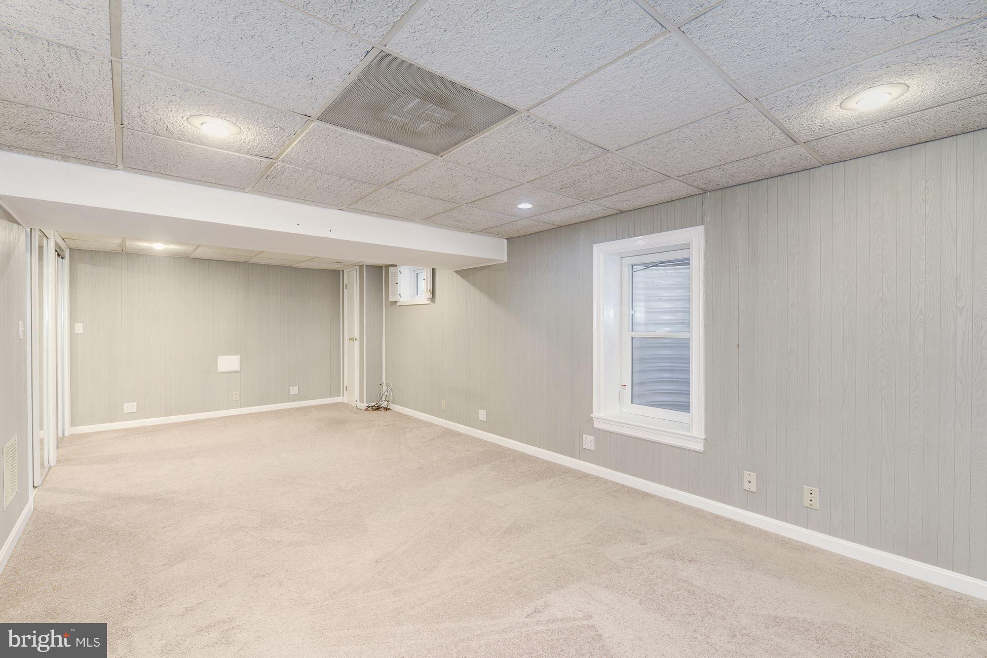 12510 Goodhill Road Silver Spring, MD 20906 - Photo 18 of 28 a view of an empty room with a window
