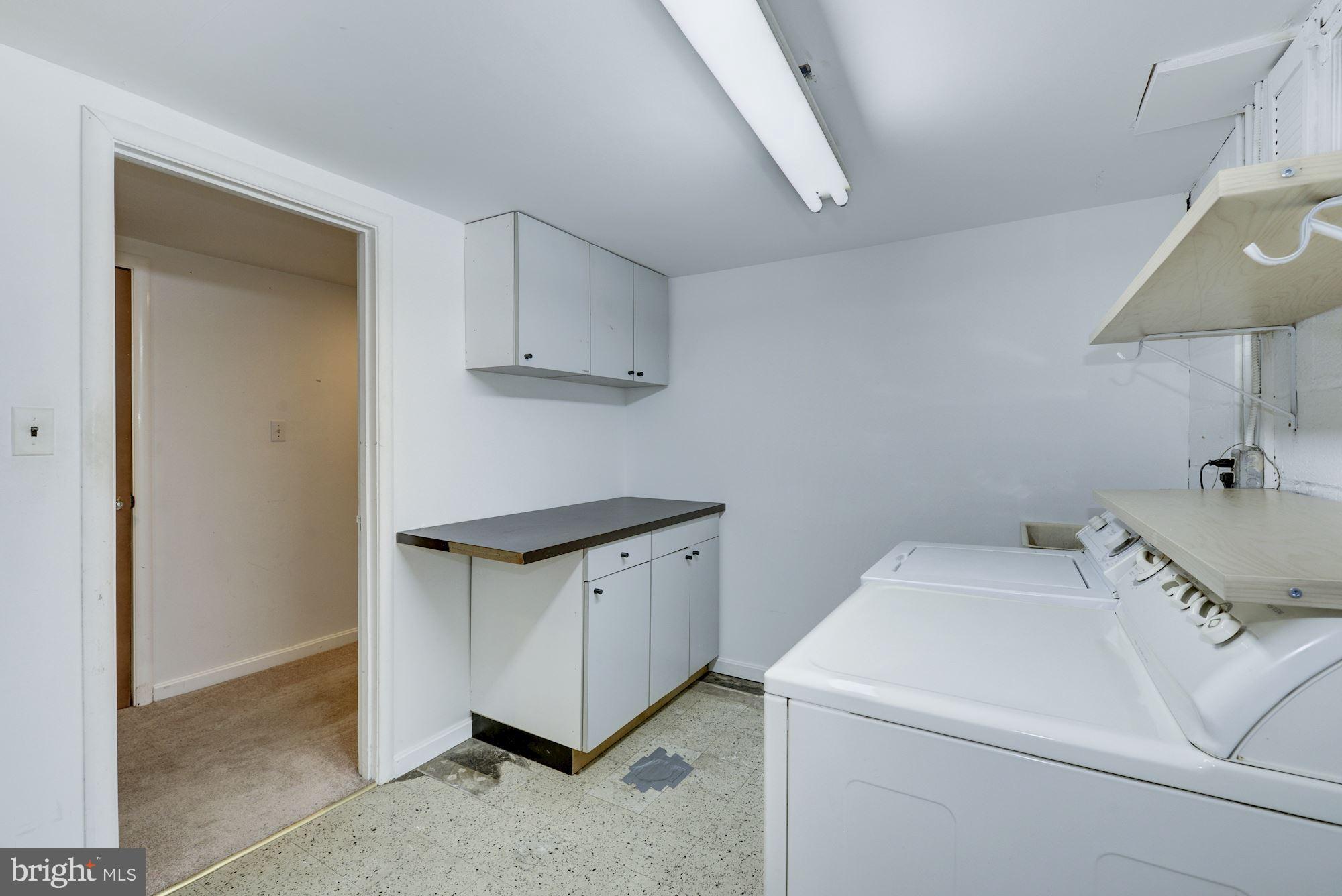 12510 Goodhill Road Silver Spring, MD 20906 - Photo 21 of 28 a utility room with dryer and washer