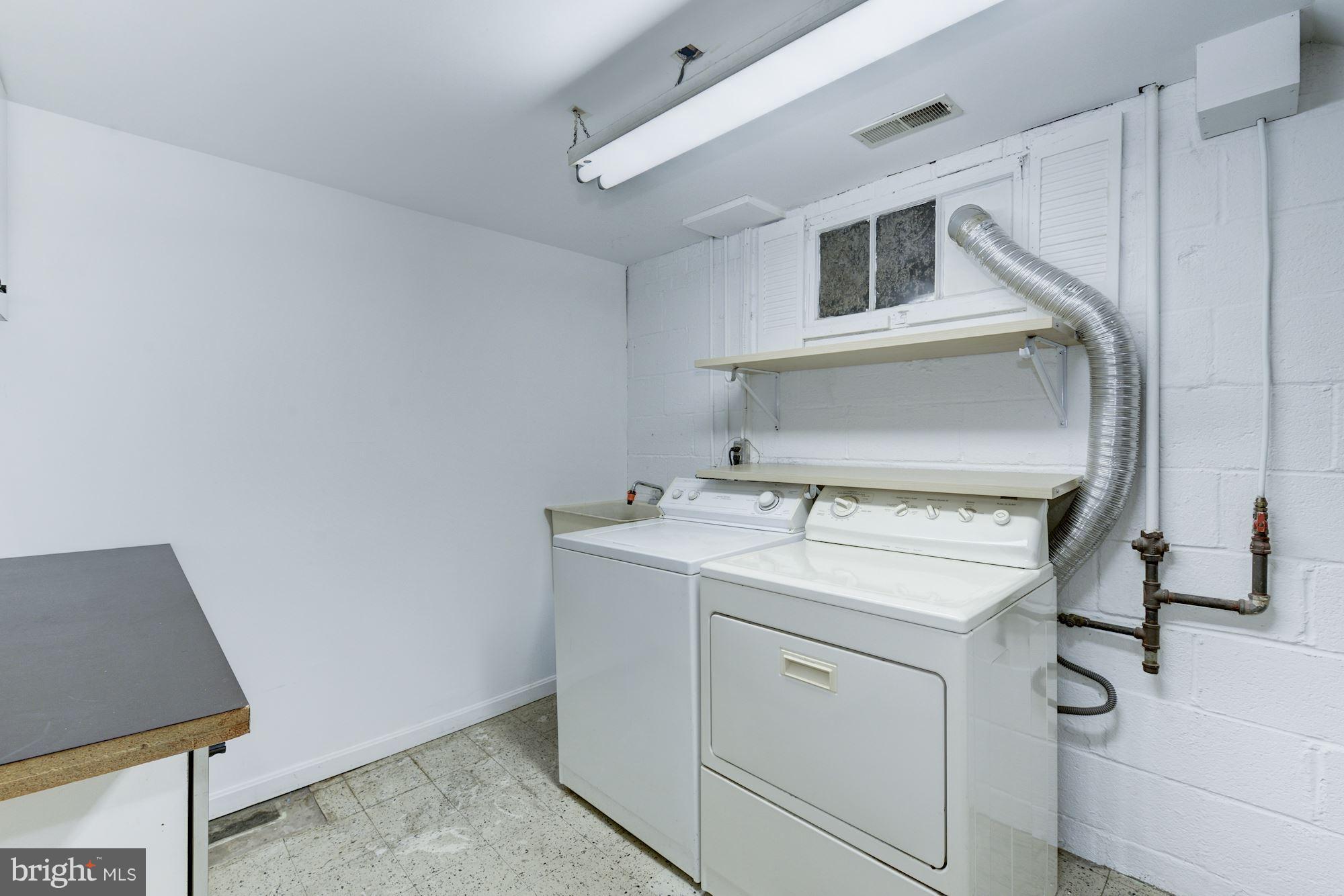 12510 Goodhill Road Silver Spring, MD 20906 - Photo 22 of 28 a utility room with dryer and washer