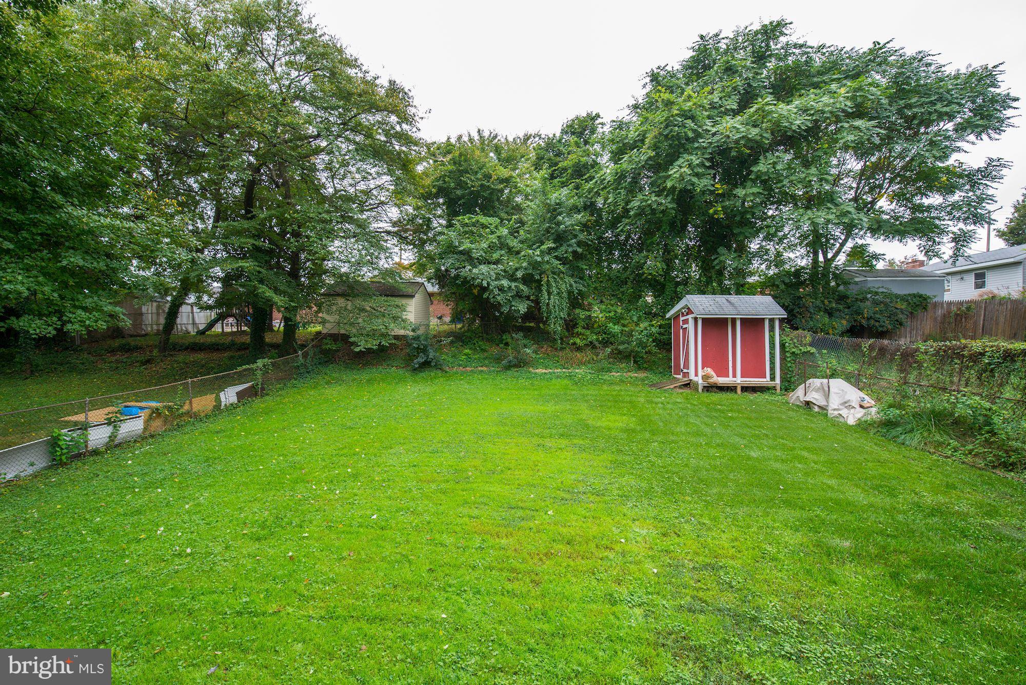12510 Goodhill Road Silver Spring, MD 20906 - Photo 26 of 28 a view of a backyard with a garden