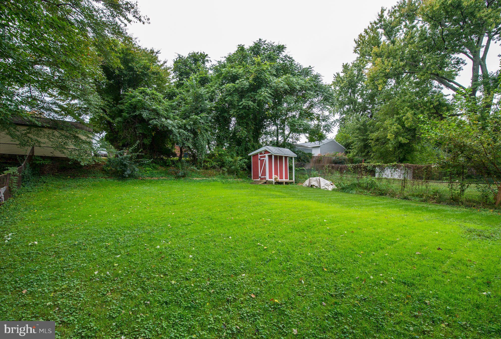 12510 Goodhill Road Silver Spring, MD 20906 - Photo 27 of 28 a view of a house with backyard and garden