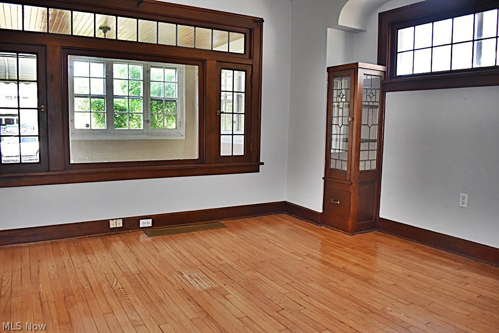 7715 Ackley Road Parma, OH 44129 - Photo 4 of 27 View of the enclosed front porch from the Dining Room. Gorgeous natural original woodwork!