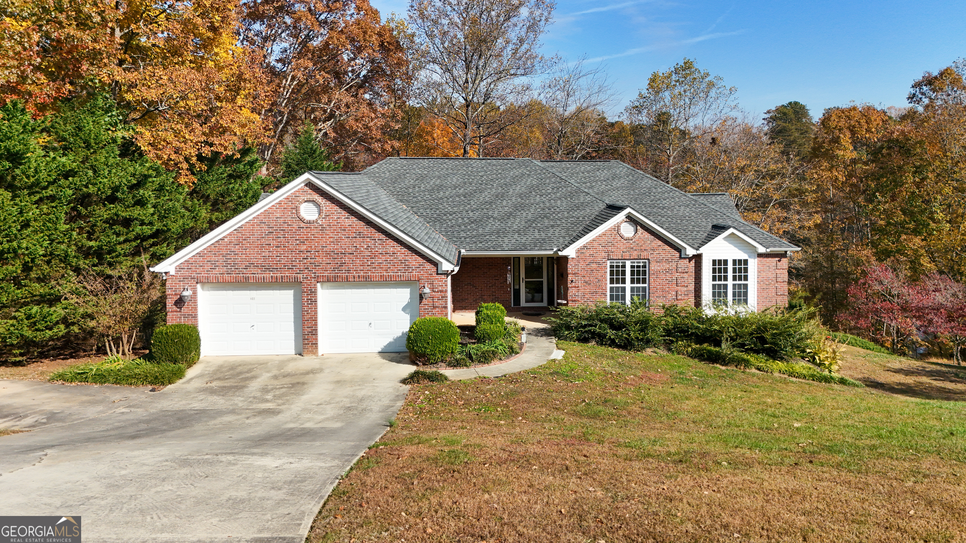 401 Pointe Willow Drive Cleveland, GA 30528 - Photo 1 of 1 a front view of a house with a yard and garage