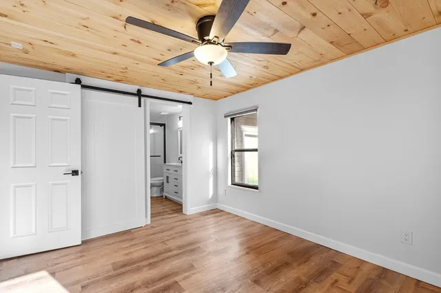 a view of a back yard of the house