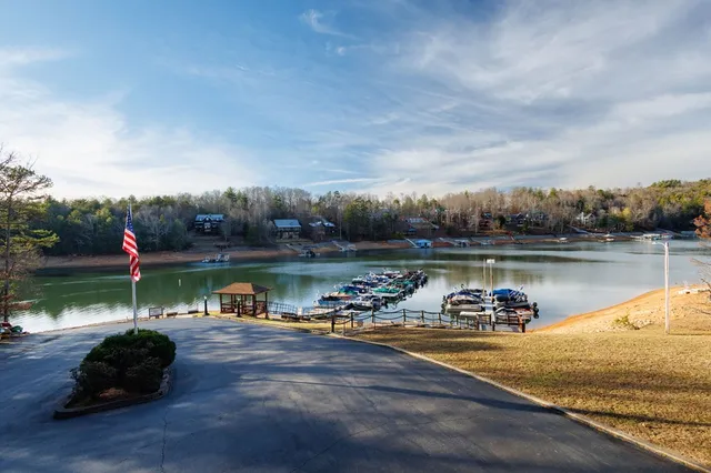a view of a street with trees in the background