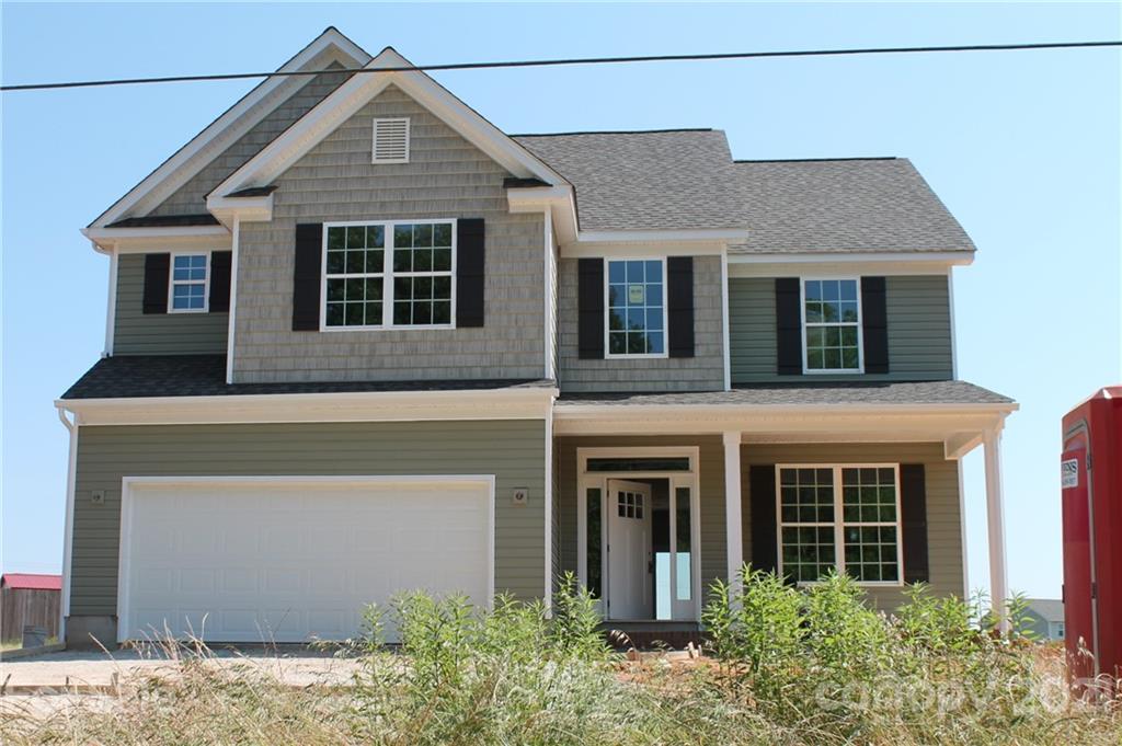 4721 Stack Road Monroe, NC 28112 - Photo 2 of 2 a front view of a house with garage