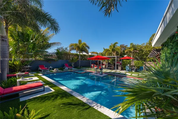 a view of yard with patio