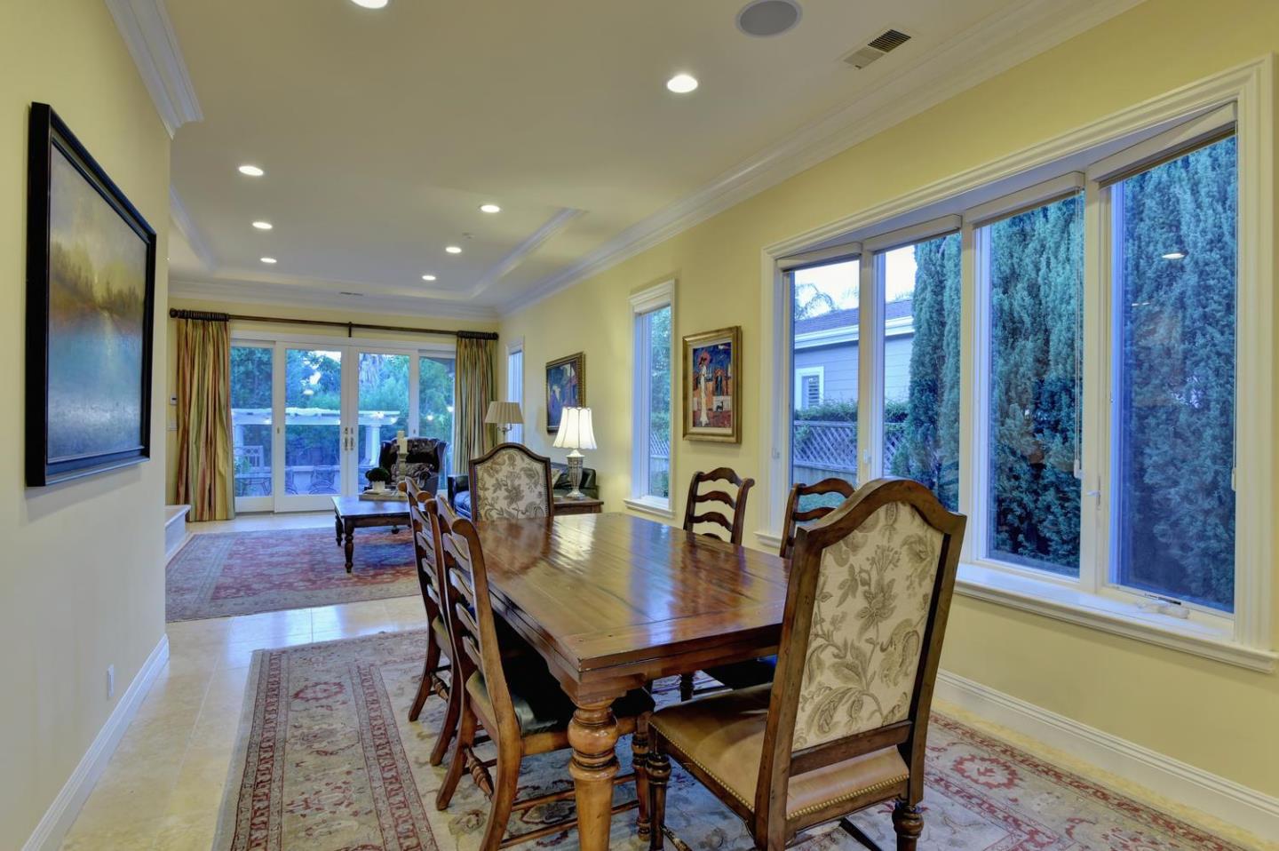 15867 Mina Way Saratoga, CA 95070 - Photo 14 of 43 a view of a dining room with furniture window and wooden floor