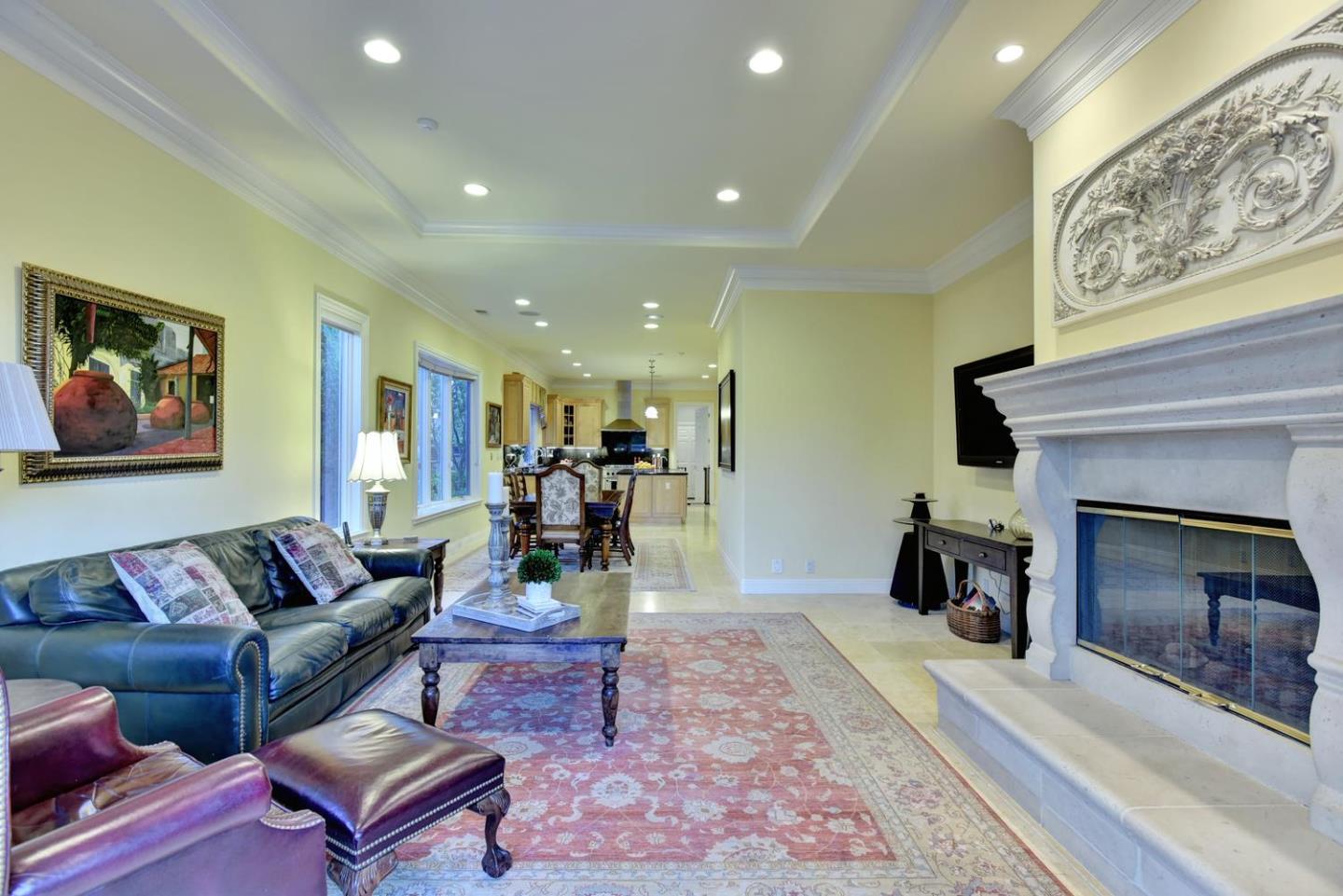 15867 Mina Way Saratoga, CA 95070 - Photo 16 of 43 a living room with furniture and a fireplace