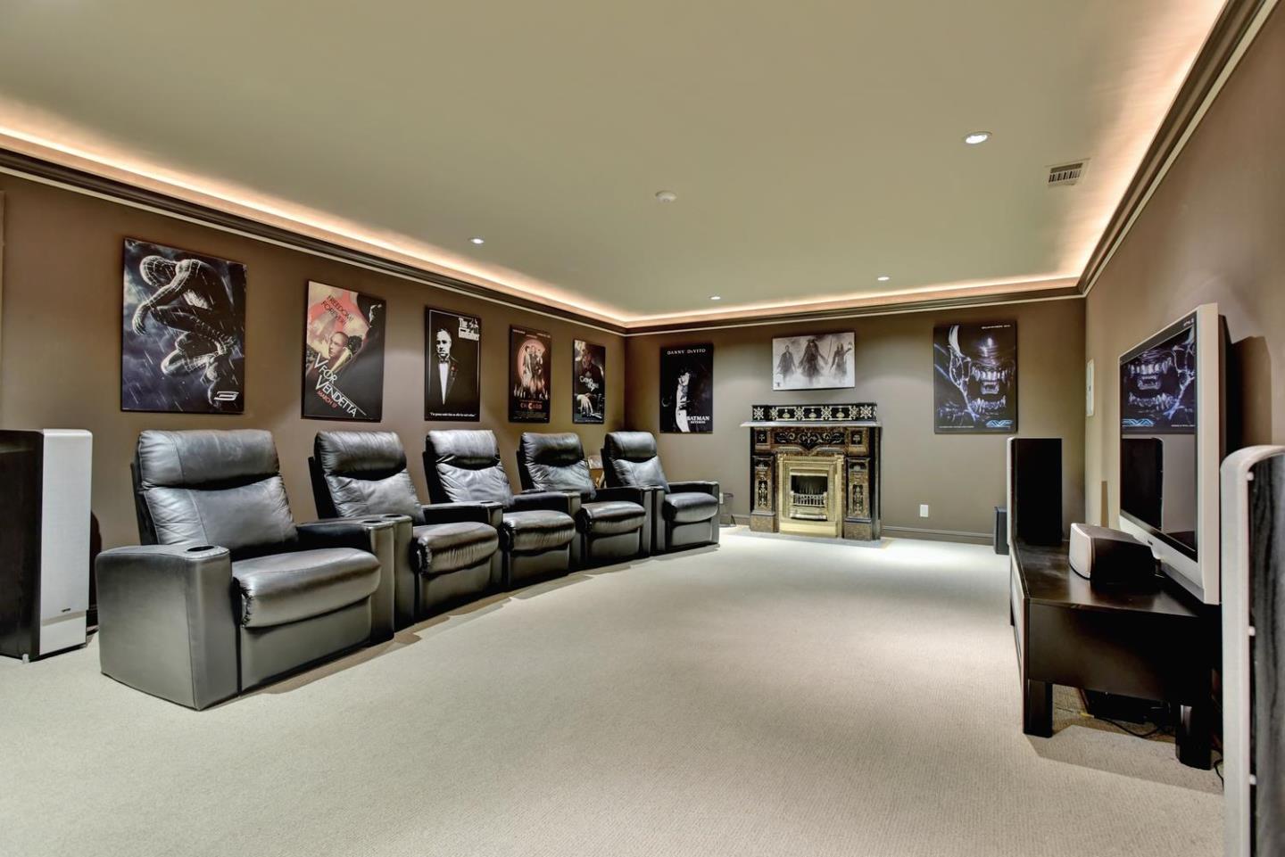 15867 Mina Way Saratoga, CA 95070 - Photo 30 of 43 a living room with furniture and a flat screen tv