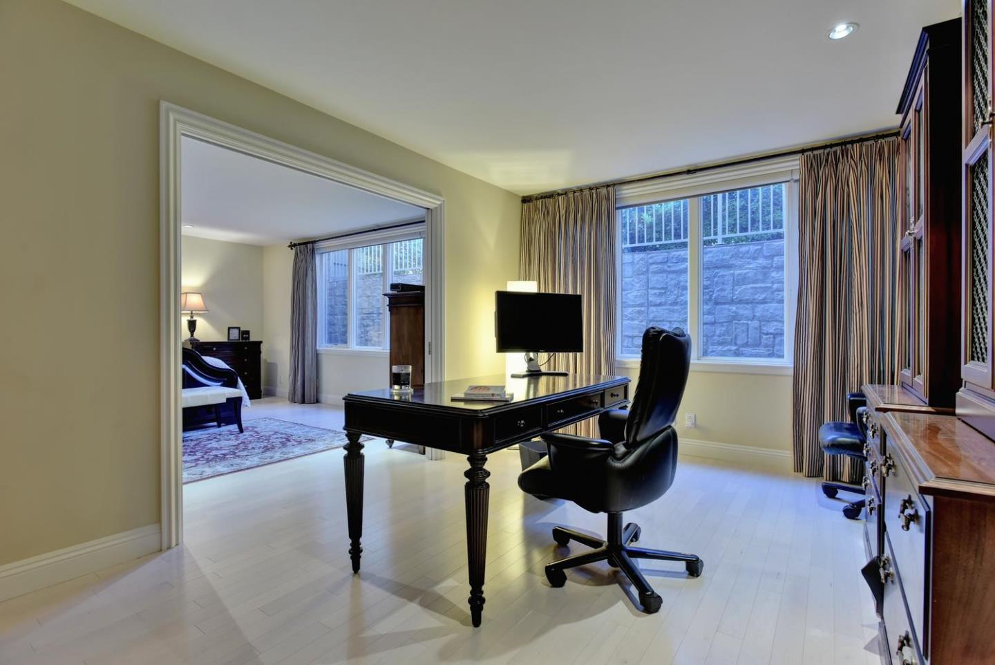 15867 Mina Way Saratoga, CA 95070 - Photo 32 of 43 a view of a livingroom with workspace and a window
