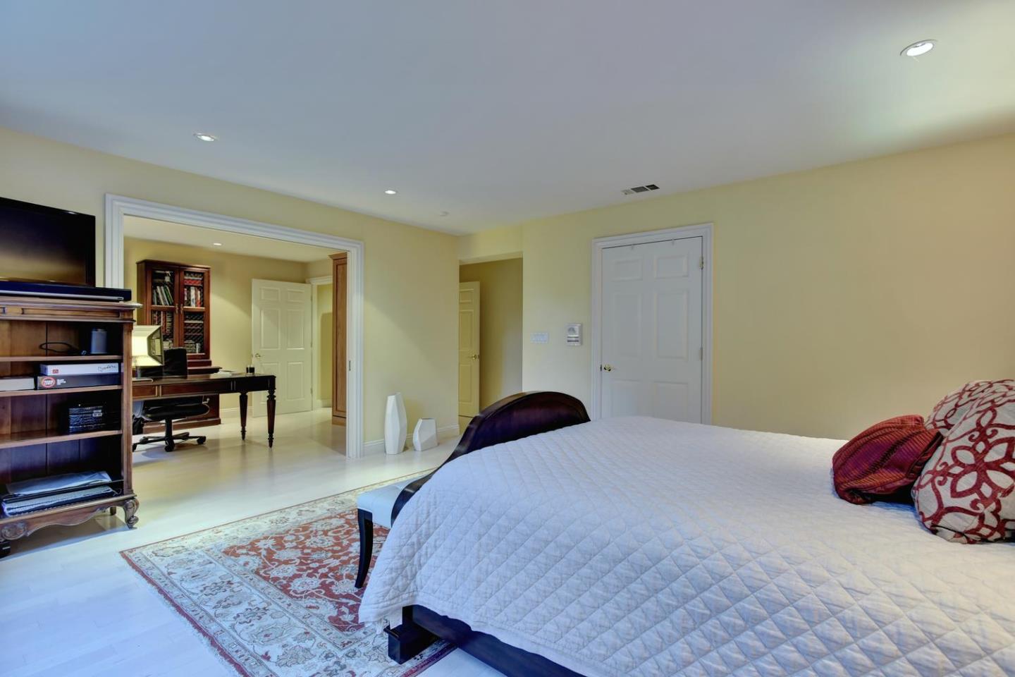 15867 Mina Way Saratoga, CA 95070 - Photo 34 of 43 a bedroom with a bed and furniture