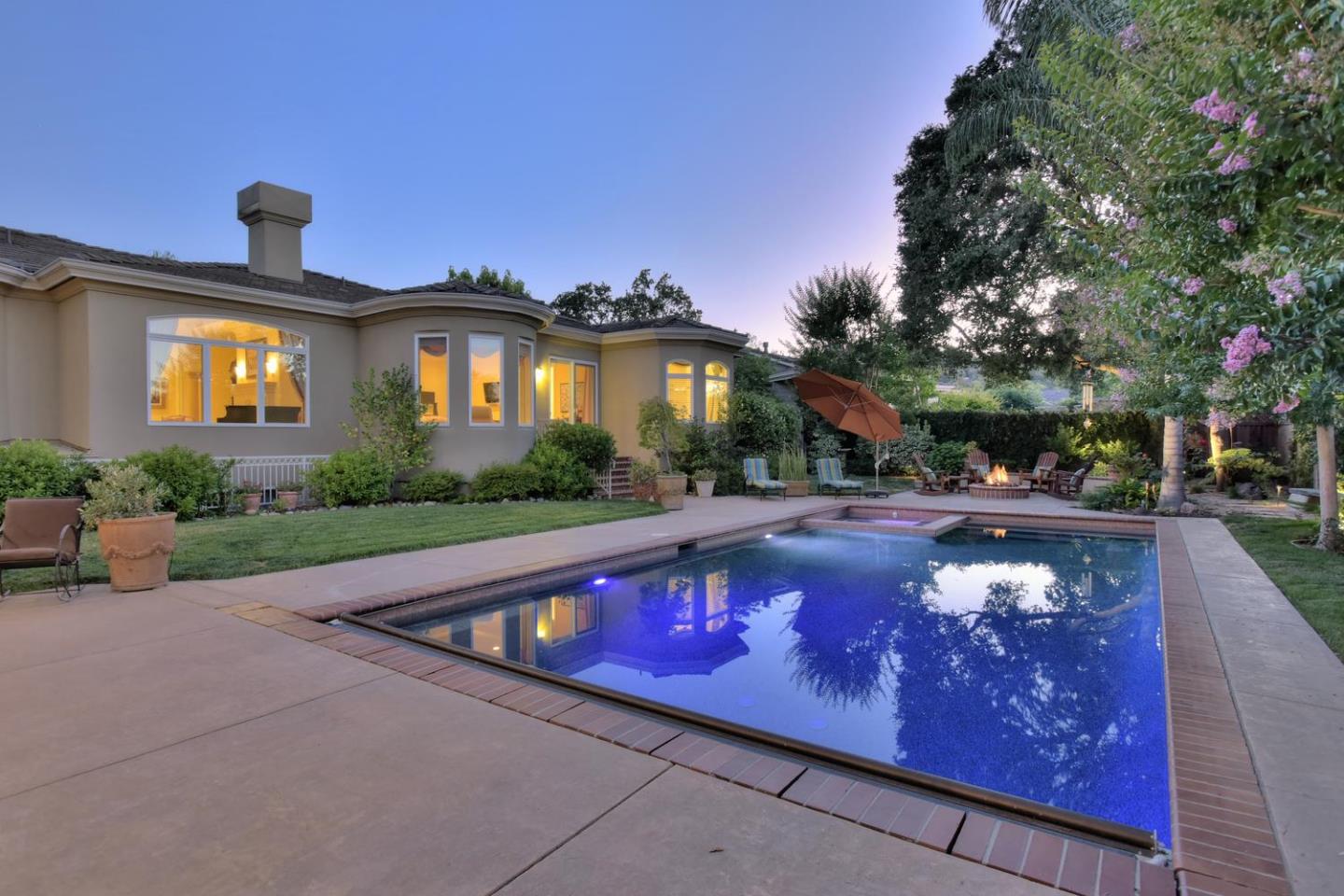 15867 Mina Way Saratoga, CA 95070 - Photo 39 of 43 a front view of a house with yard