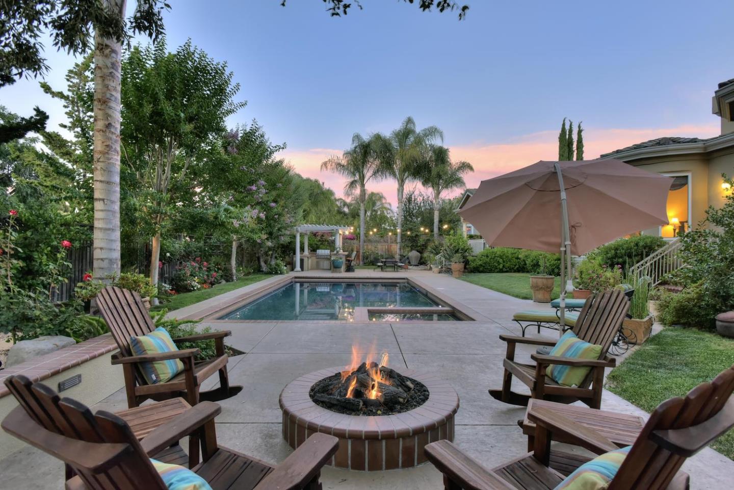 15867 Mina Way Saratoga, CA 95070 - Photo 41 of 43 a swimming pool with outdoor seating and yard