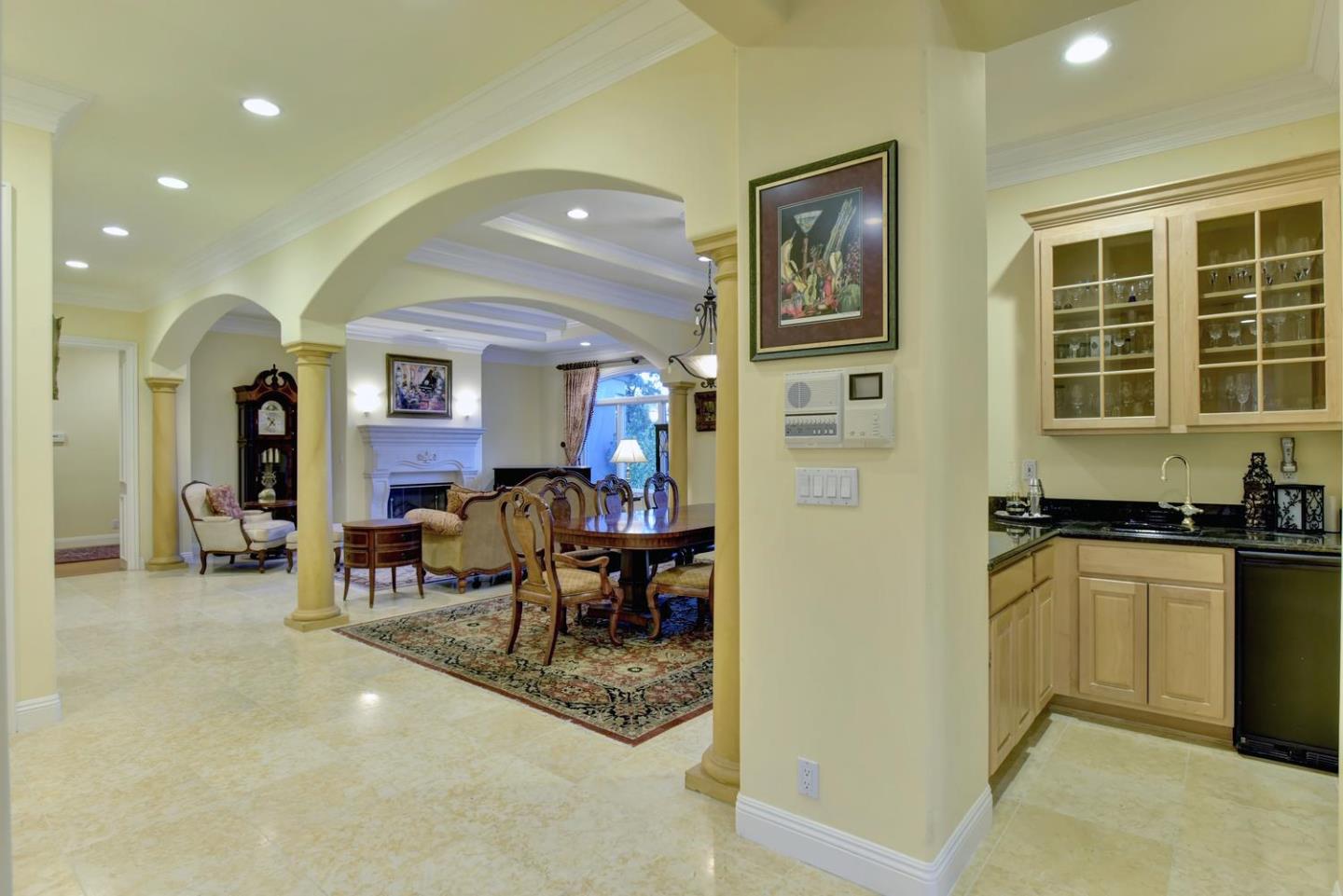 15867 Mina Way Saratoga, CA 95070 - Photo 8 of 43 a living room with furniture a window and kitchen view