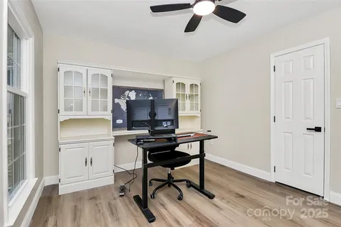 a workspace with chandelier