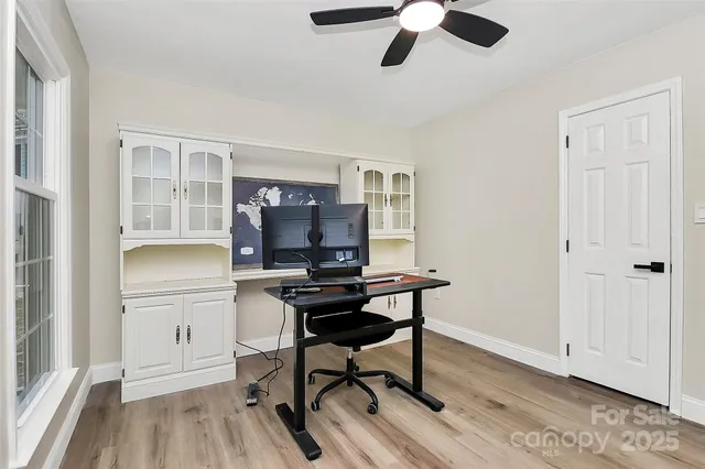 a workspace with chandelier