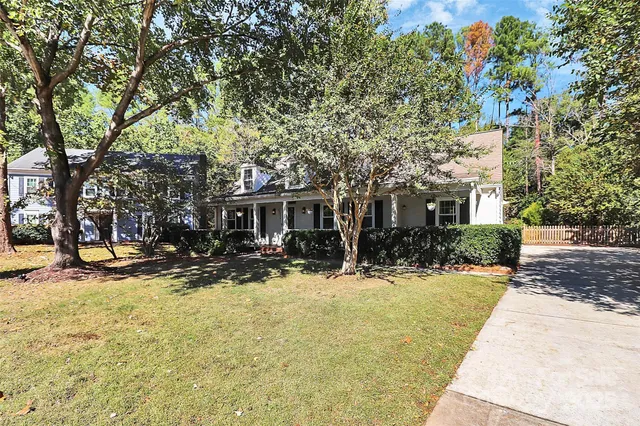 a view of a house with snow on the background