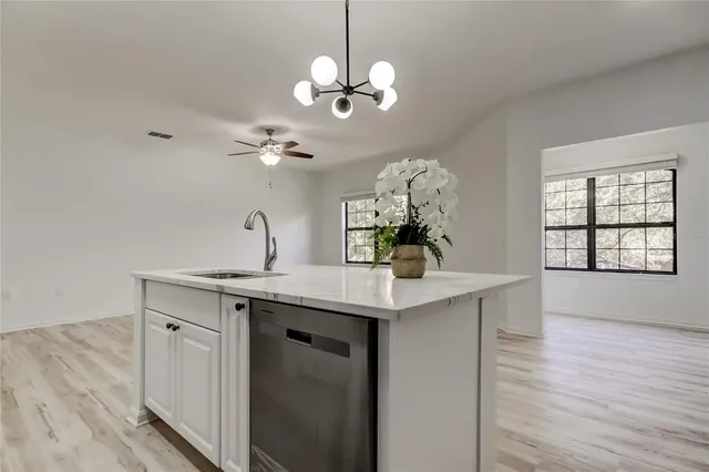 a bathroom with a bath tub with a shower