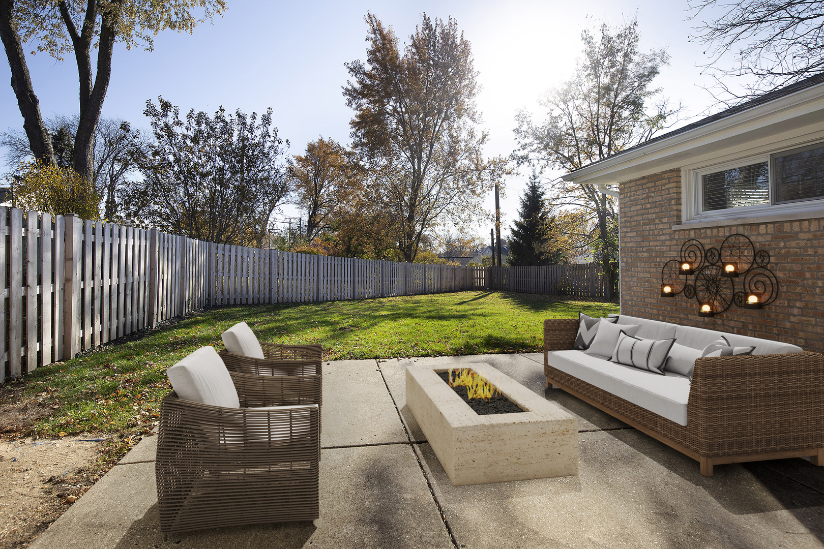 1913 Milton Avenue Northbrook, IL 60062 - Photo 12 of 24 a view of a patio with couches chairs and a fire pit