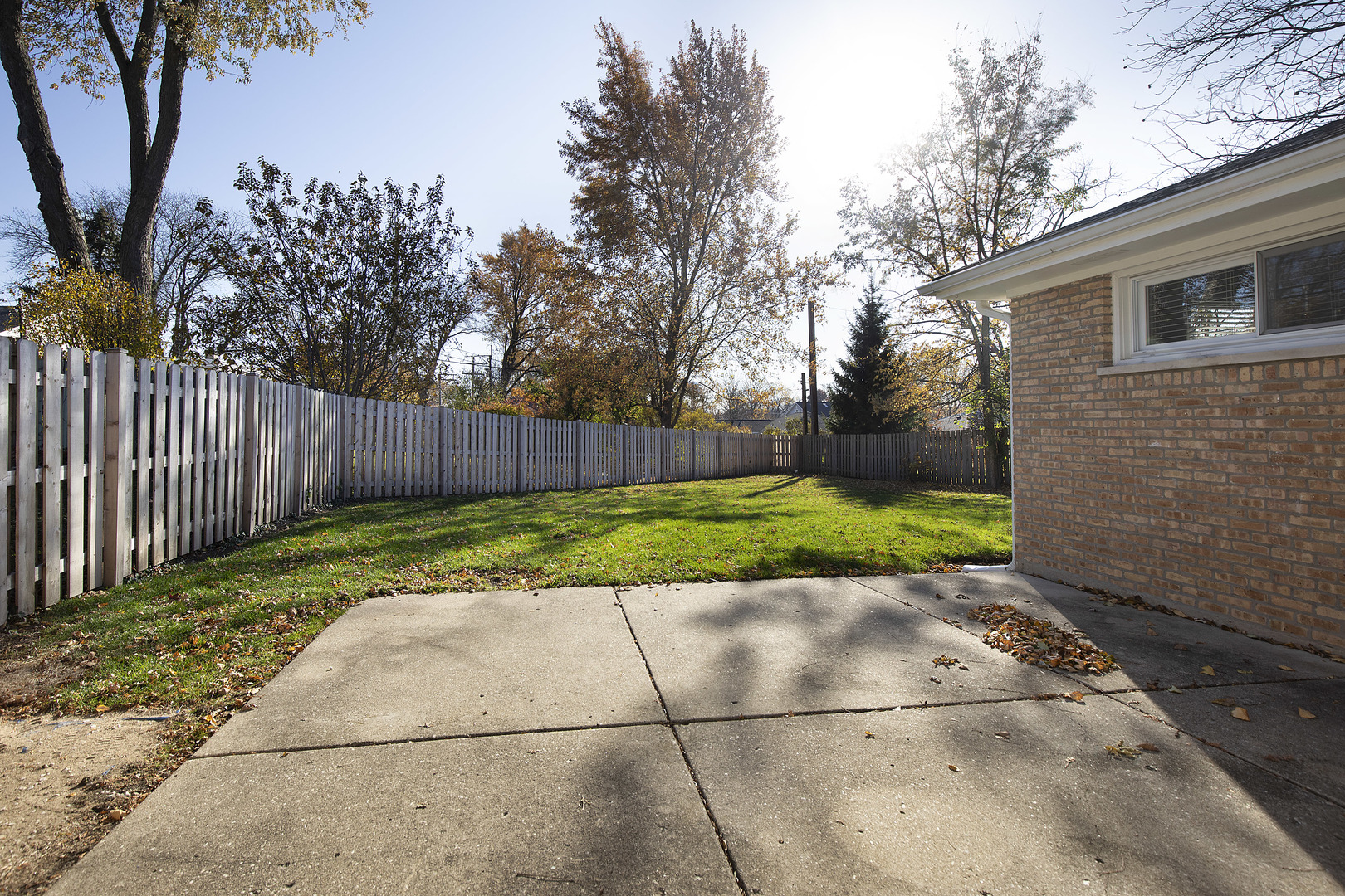 1913 Milton Avenue Northbrook, IL 60062 - Photo 23 of 24 a view of a backyard with wooden fence