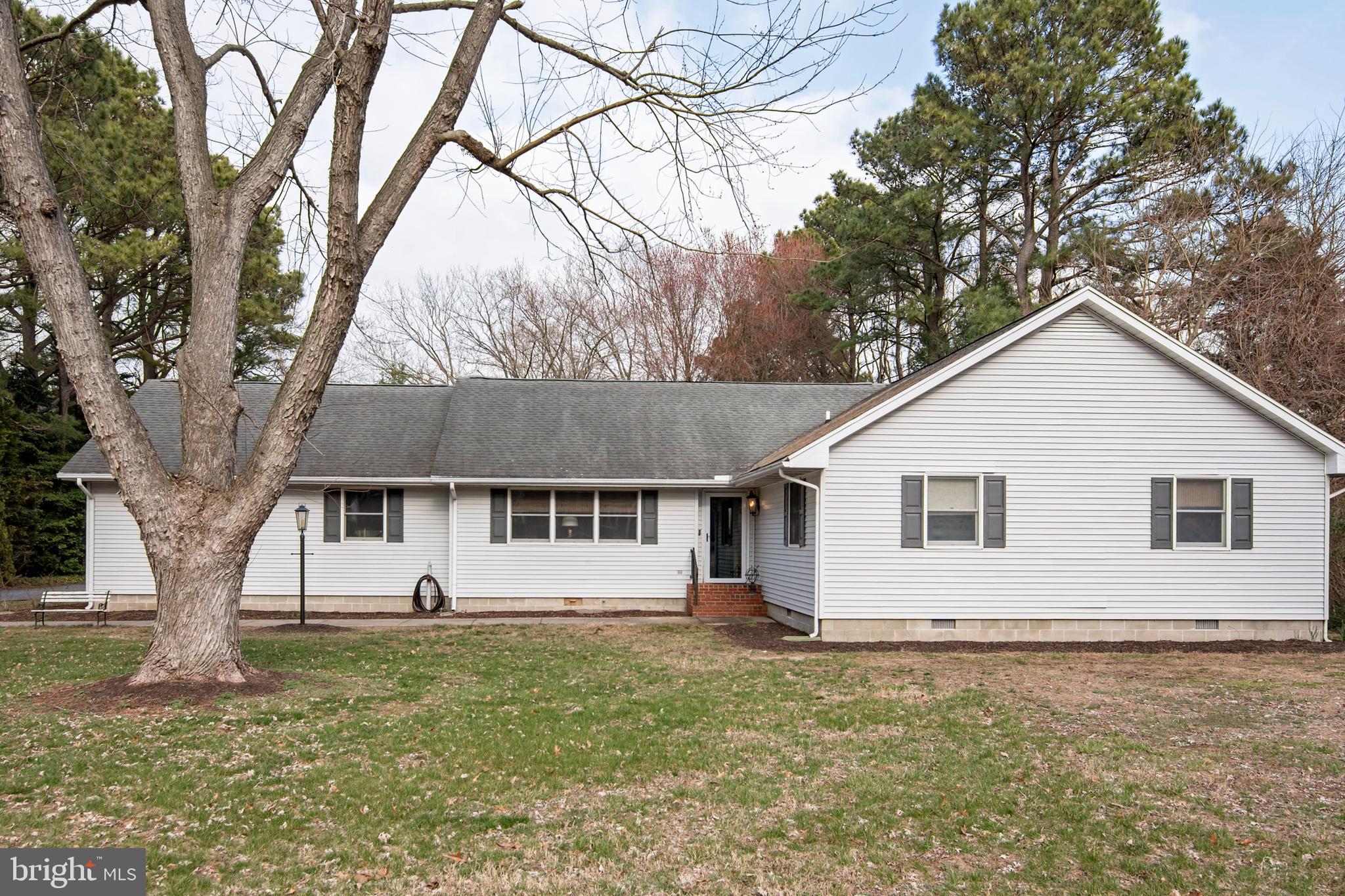 5529 Whitehall Road Cambridge, MD 21613 - Photo 14 of 41 a view of a house with a yard
