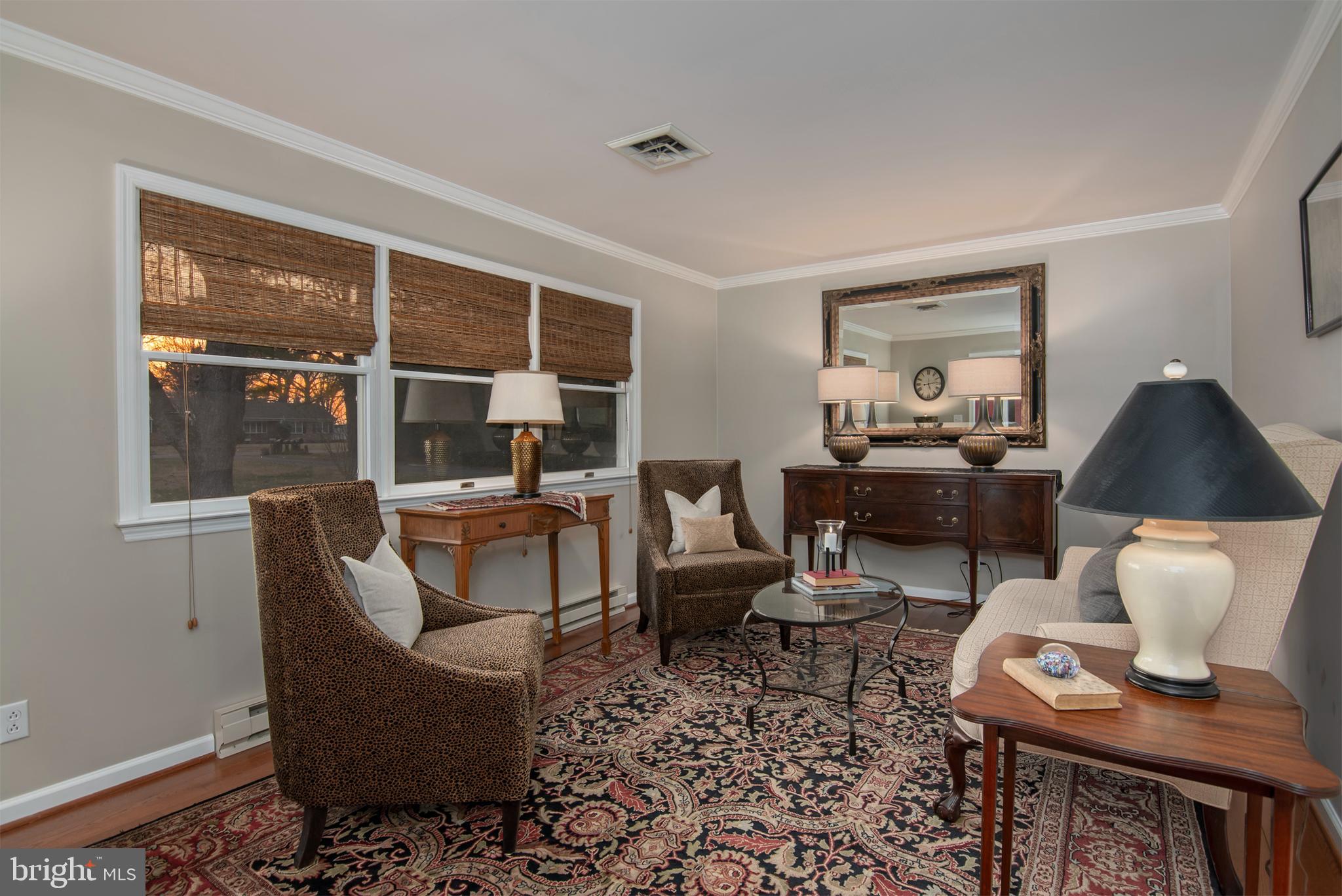 5529 Whitehall Road Cambridge, MD 21613 - Photo 16 of 41 a living room with furniture and a window
