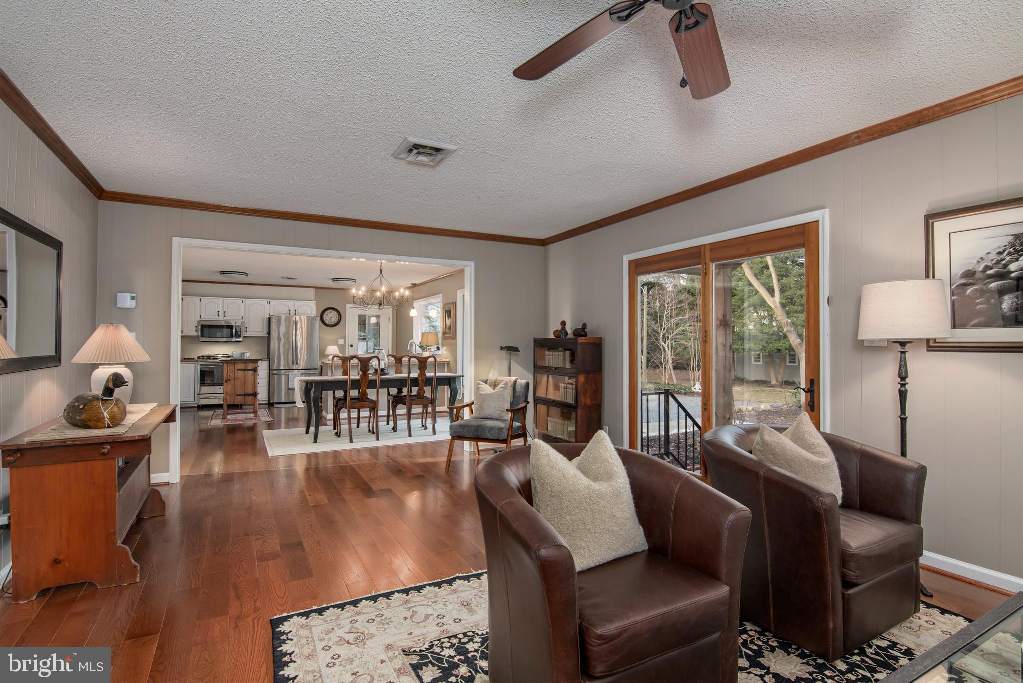 5529 Whitehall Road Cambridge, MD 21613 - Photo 19 of 41 a living room with furniture and wooden floor