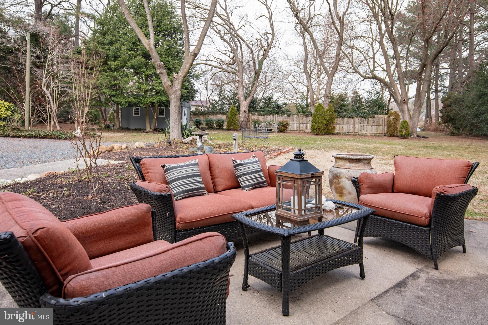 5529 Whitehall Road Cambridge, MD 21613 - Photo 10 of 41 a outdoor space with patio couches and a chairs