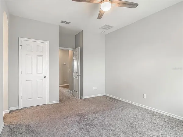 an empty room with a bathroom