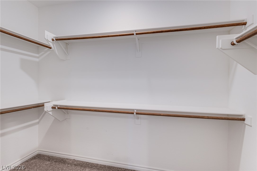 2555 Hampton Road, Unit 8206 Henderson, NV 89052 - Photo 17 of 25 Ample shelving and hanging space defines this organized closet.