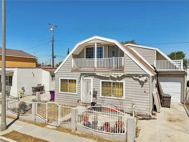 a front view of a house with a porch