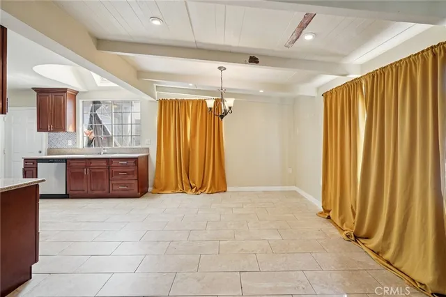 a large kitchen with a large window