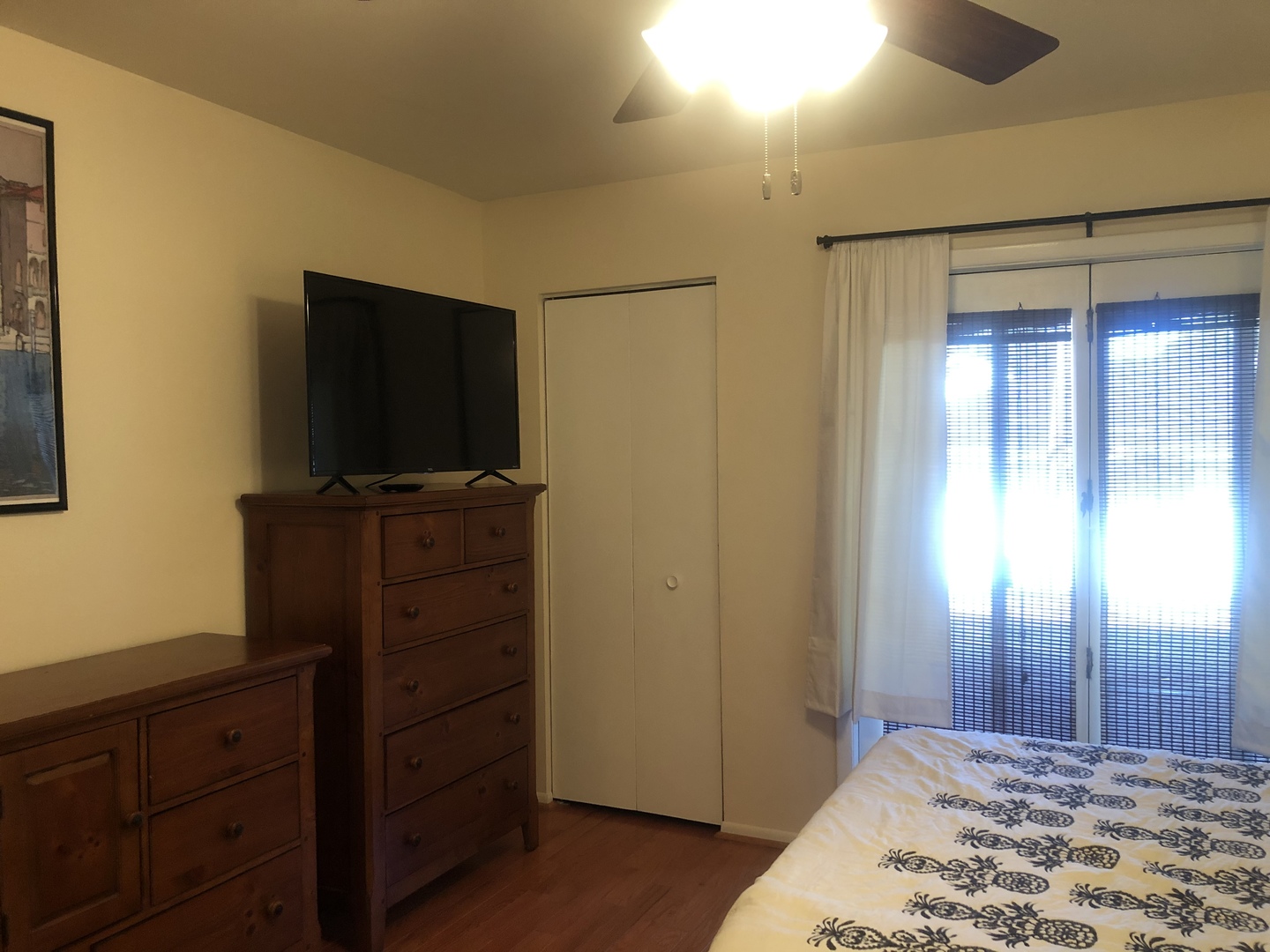3644 Harlem Avenue Riverside, IL 60546 - Photo 14 of 35 a bedroom with a bed and a flat screen tv