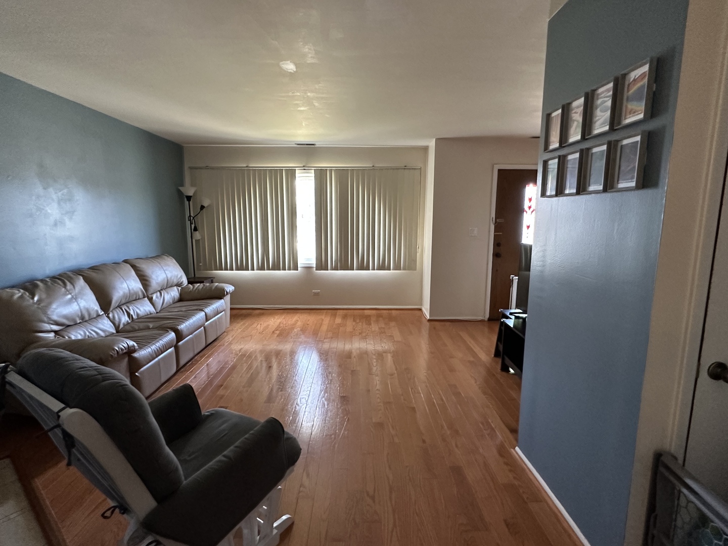 3644 Harlem Avenue Riverside, IL 60546 - Photo 4 of 35 a living room with furniture and a wooden floor