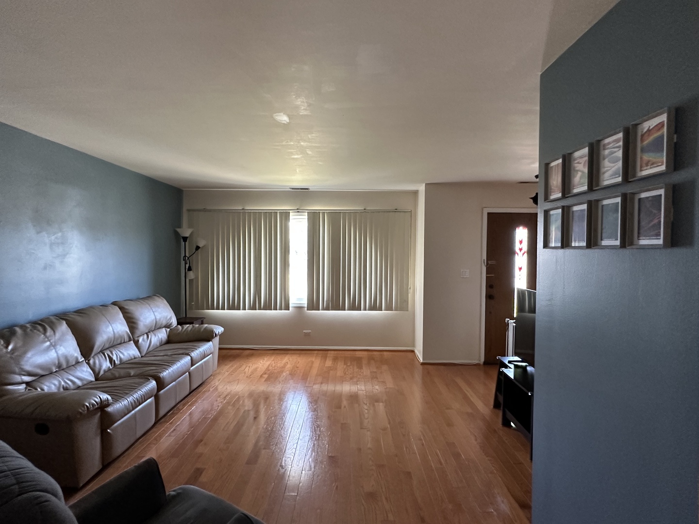 3644 Harlem Avenue Riverside, IL 60546 - Photo 7 of 35 a living room with furniture and a wooden floor